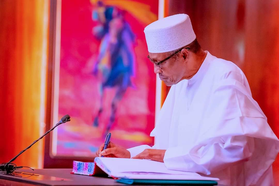 President Buhari swears in 7 new ministers, reshuffles cabinet