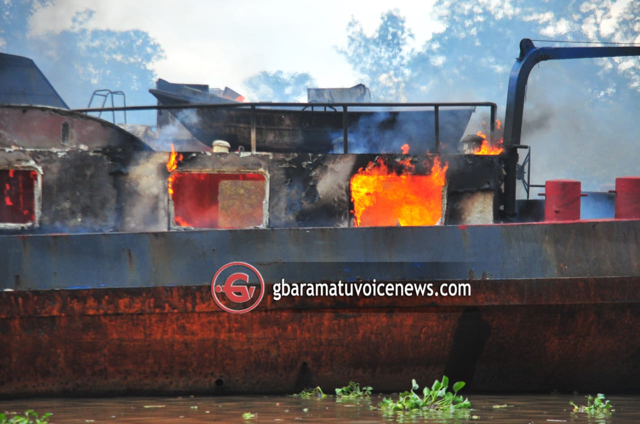 BREAKING: Nigerian military sets ablaze vessel caught loading illegal crude oil in Delta by Tompolo and his men